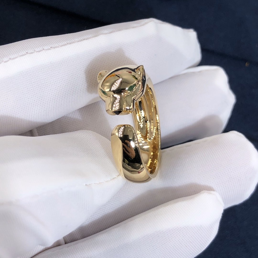 Bague Panthère de Cartier sur mesure en or jaune 18 carats,Onyx et 2 Grenats Tsavorite