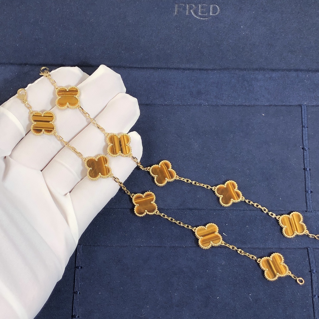 Van Cleef & Arpels Vintage Alhambra 5 Bracelet Motifs sur mesure en or jaune 18 carats avec oeil de tigre
