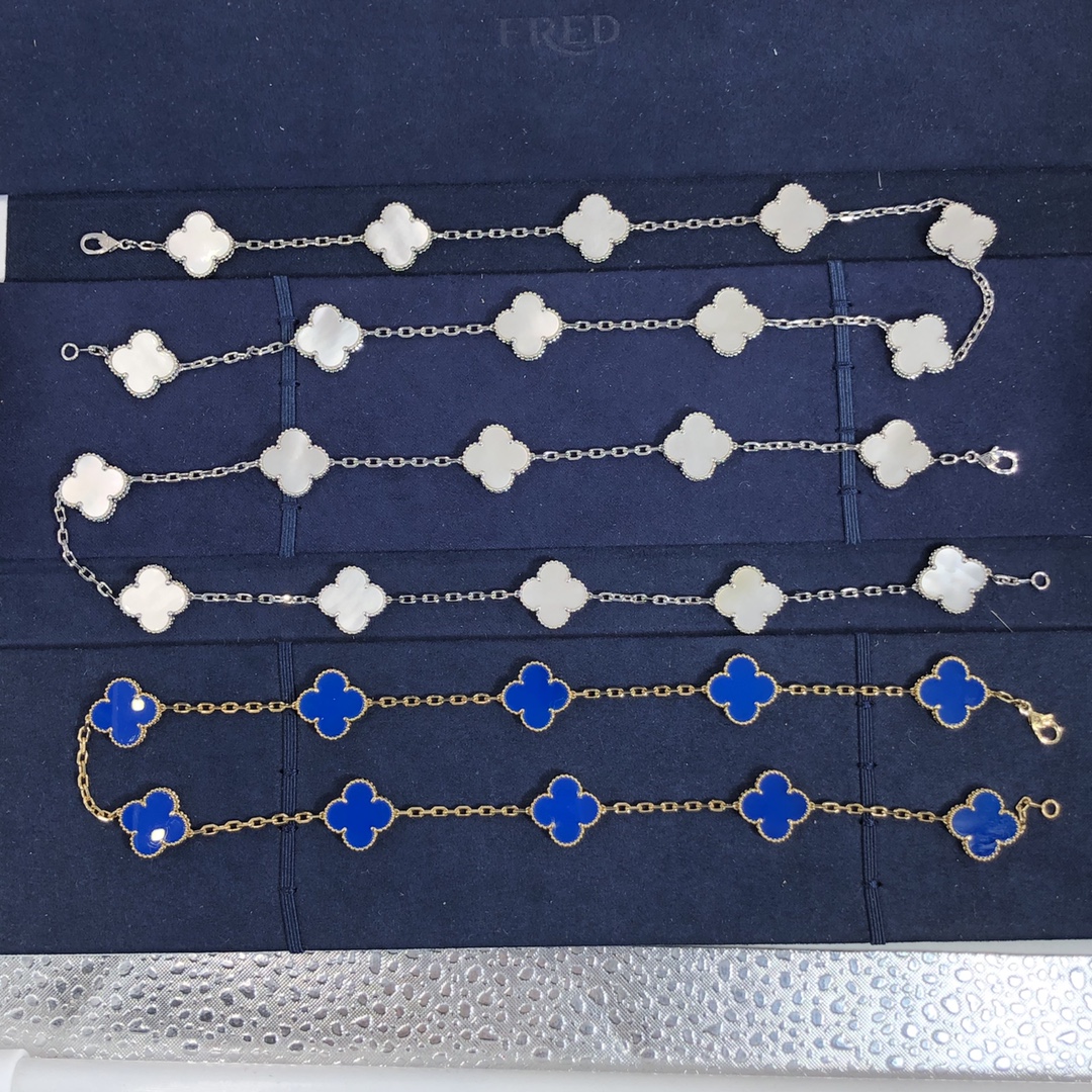 Van Cleef & Arpels Vintage Alhambra 10 Pendentif Motifs sur mesure en or blanc 18 carats avec nacre blanche